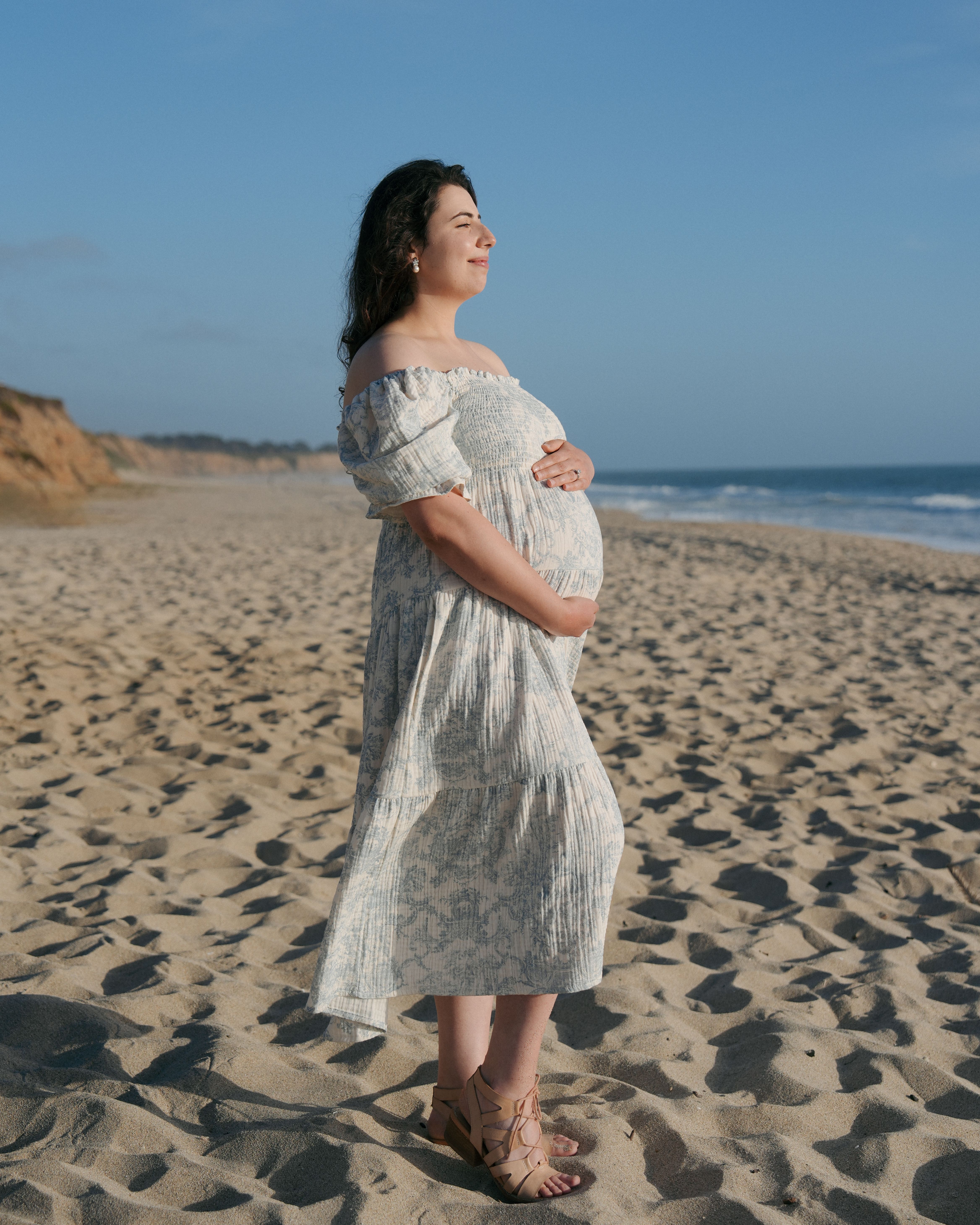 Maternity embrace at a coastal lookout in Stinson Beach, California