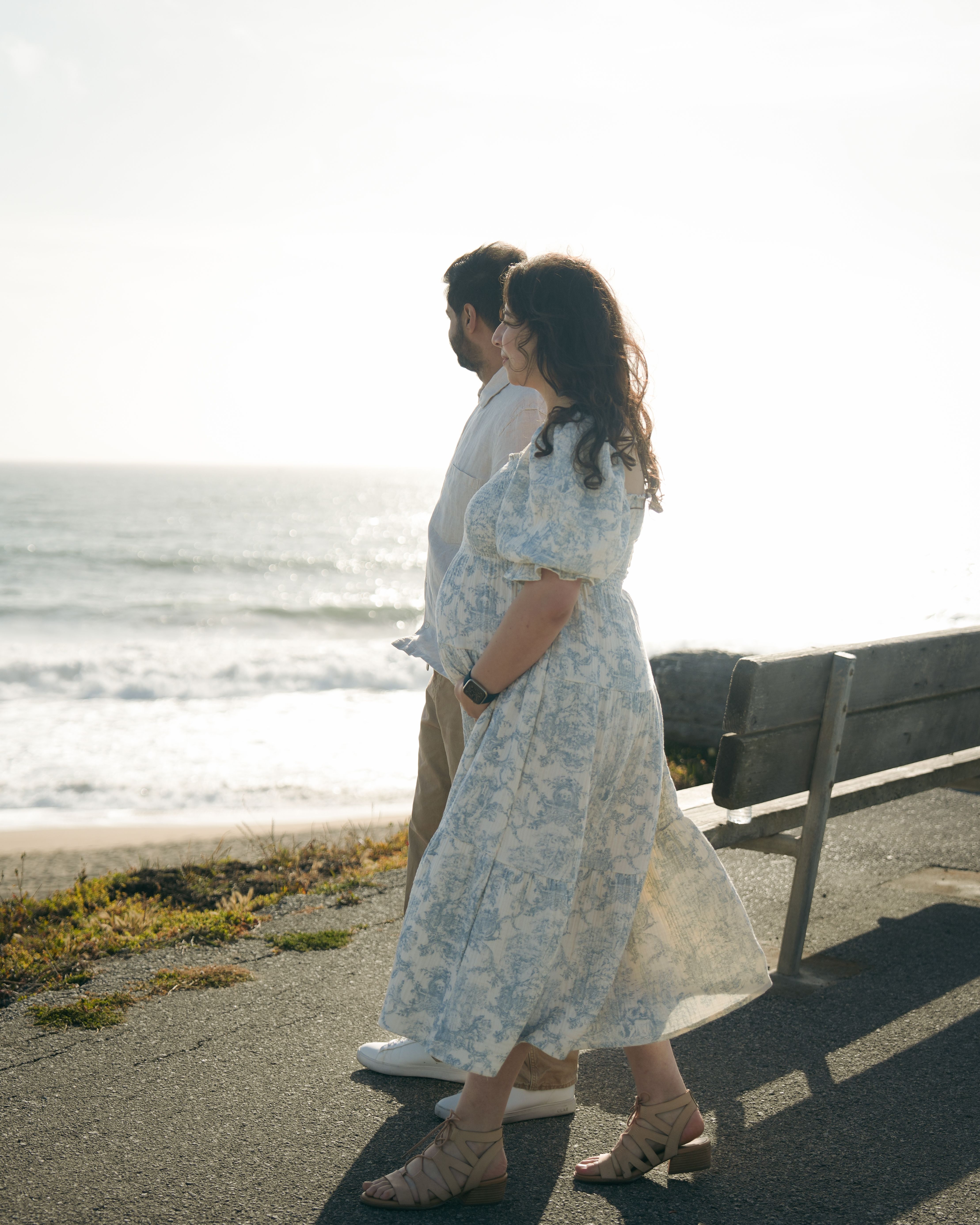 Standing maternity portrait on the sand in Moss Beach, California