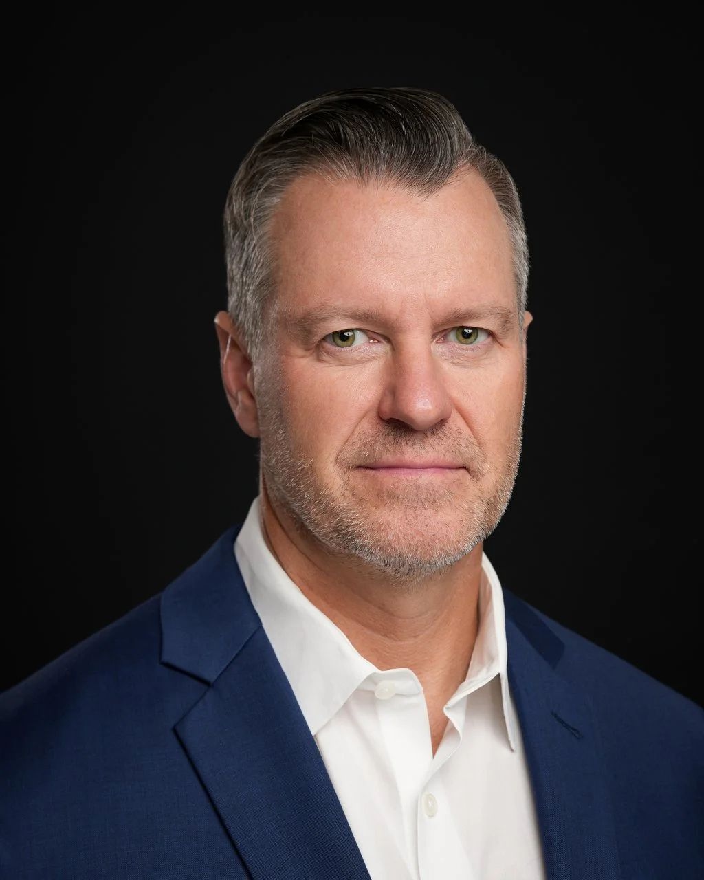 Professional men’s headshot on University Avenue in Palo Alto, California.
