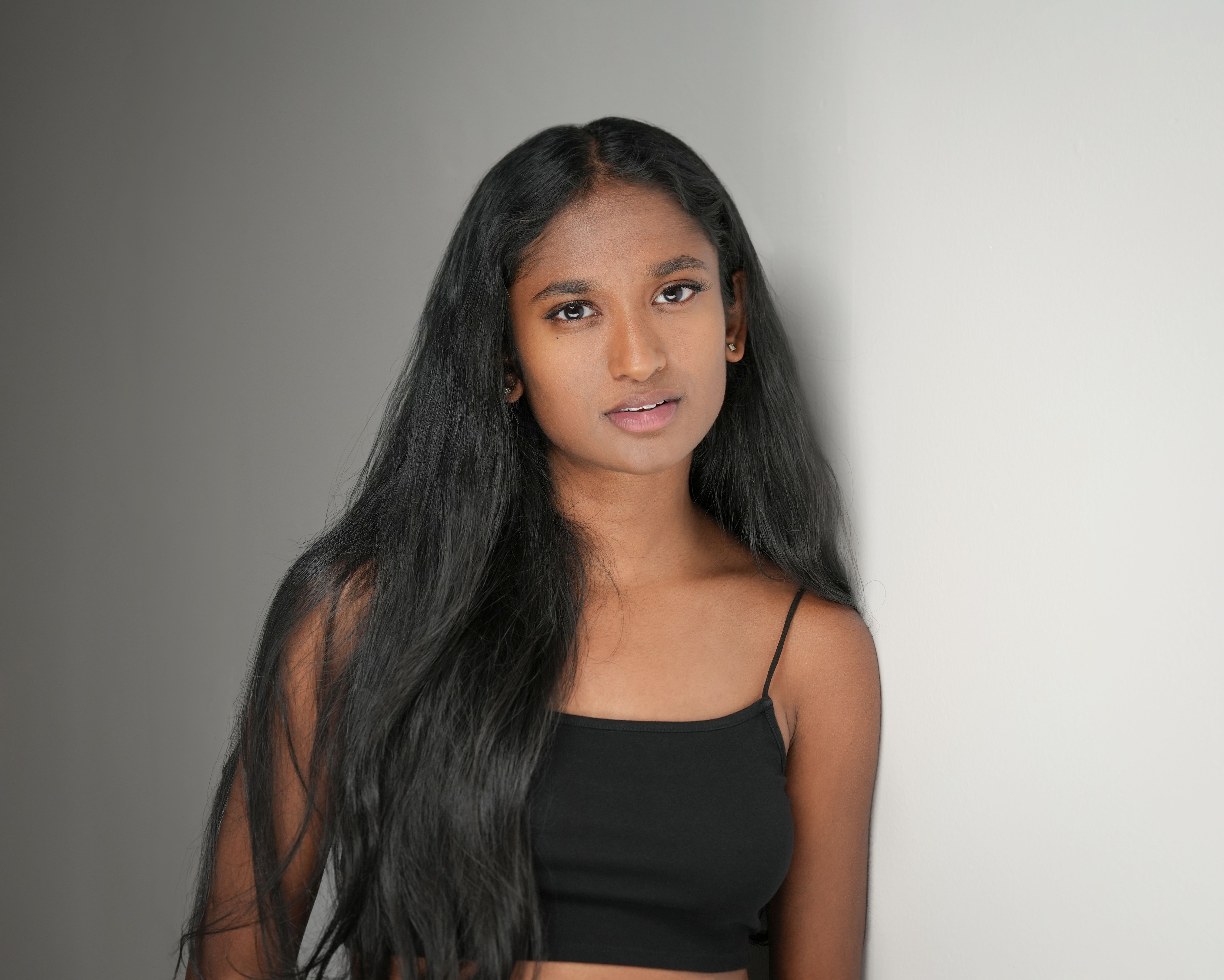 Grey-wall modeling portrait in San Jose, California