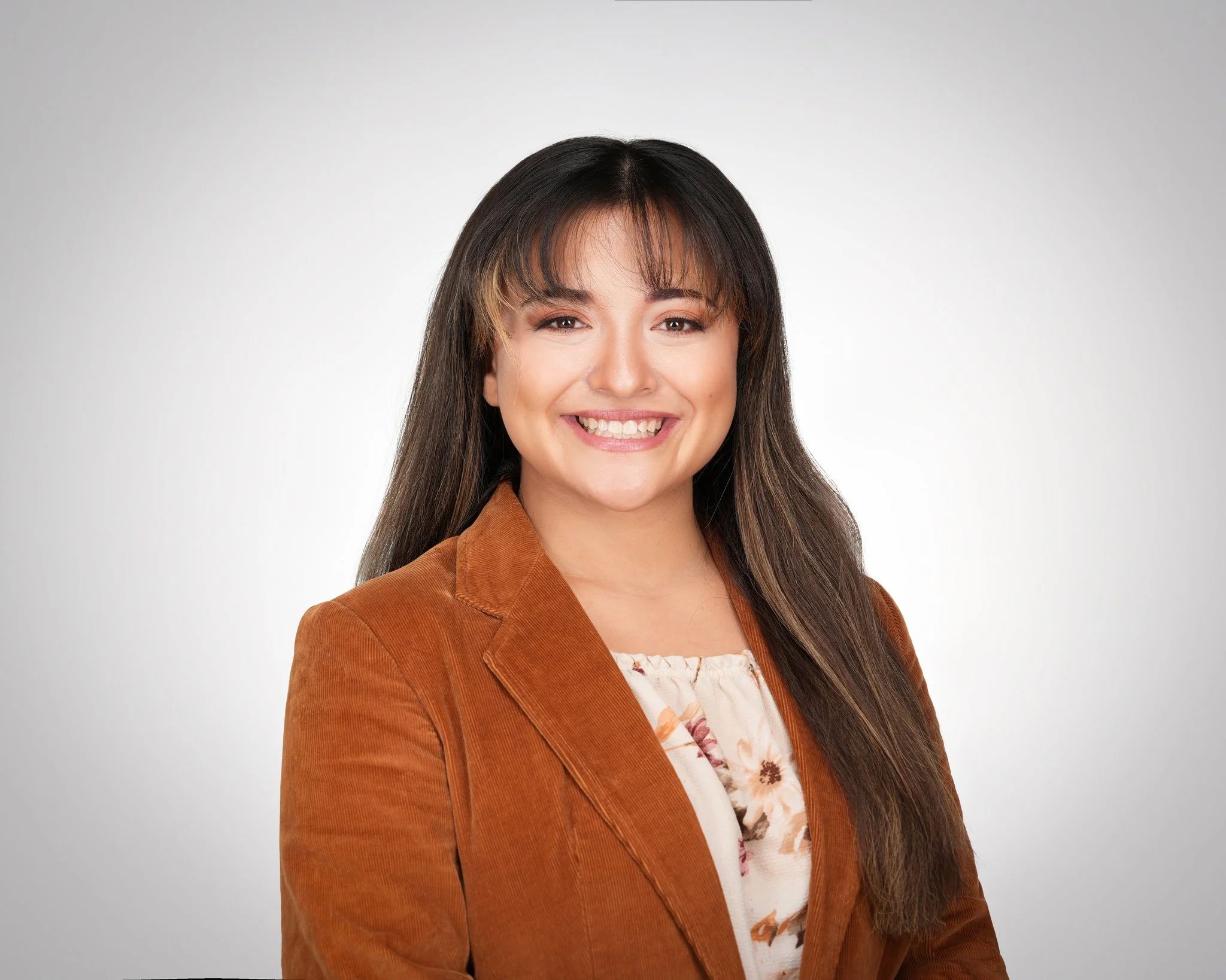 Professional women’s headshot at Courthouse Square in Redwood City, California.