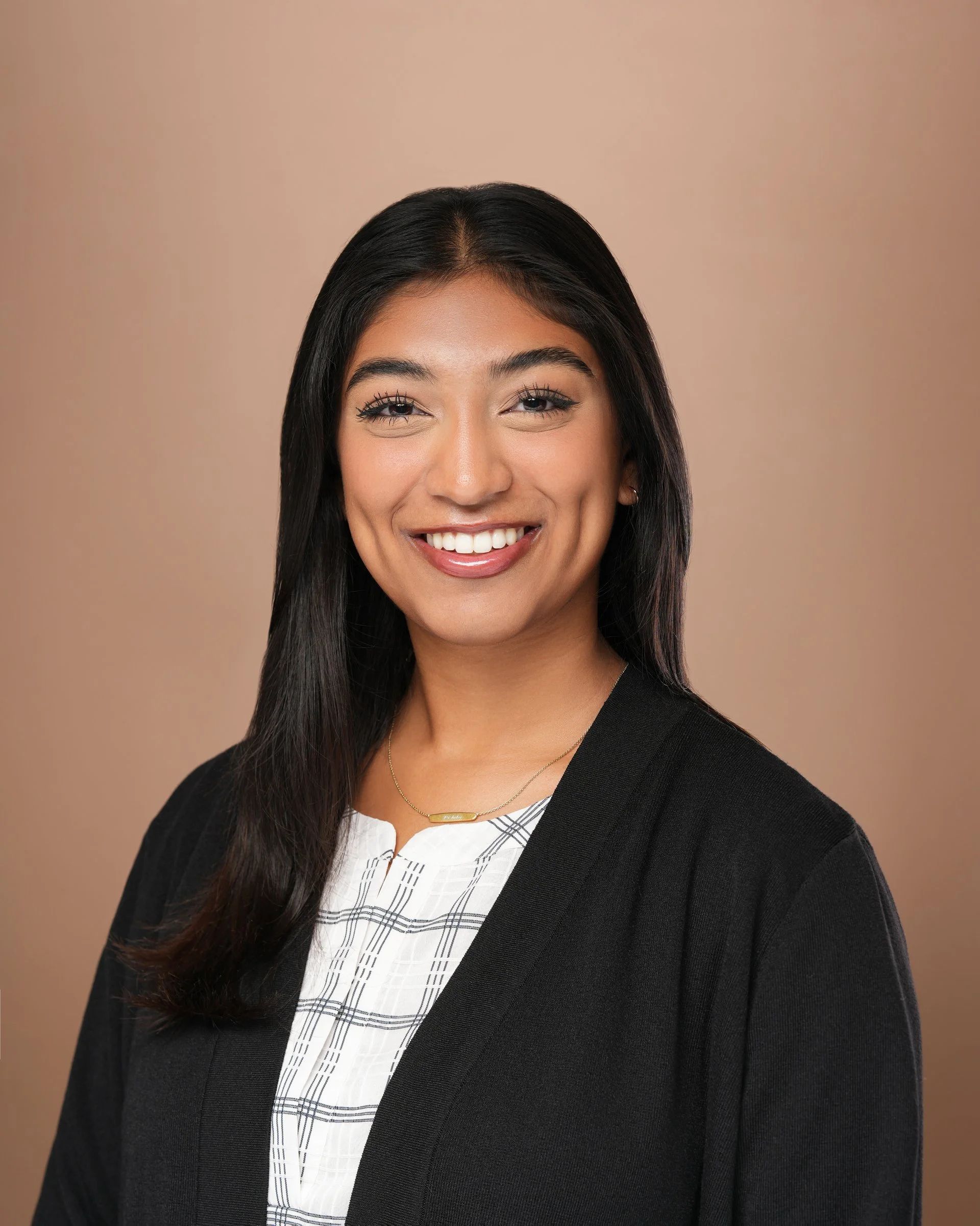 Professional women’s headshot on Grand Avenue in South San Francisco, California.